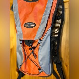 Orange and Gray camel pack NWOT